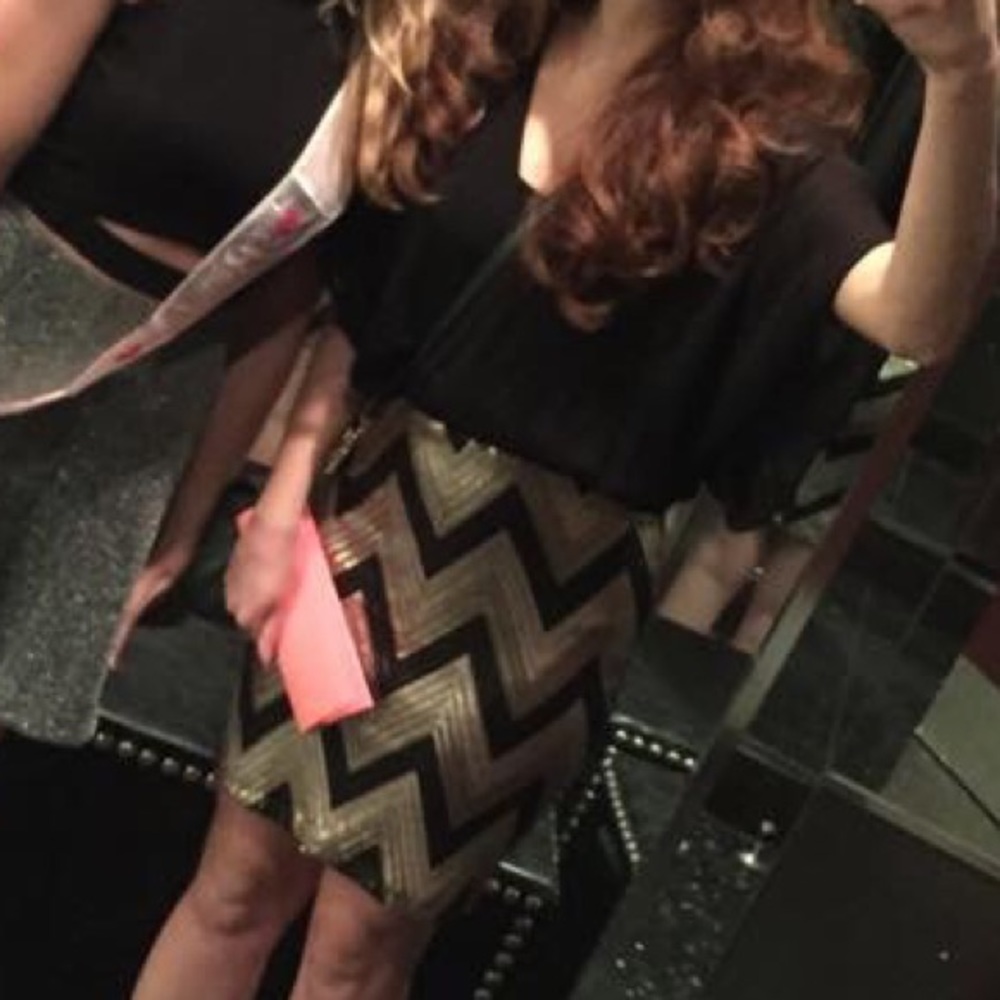 Black and gold sequin dress